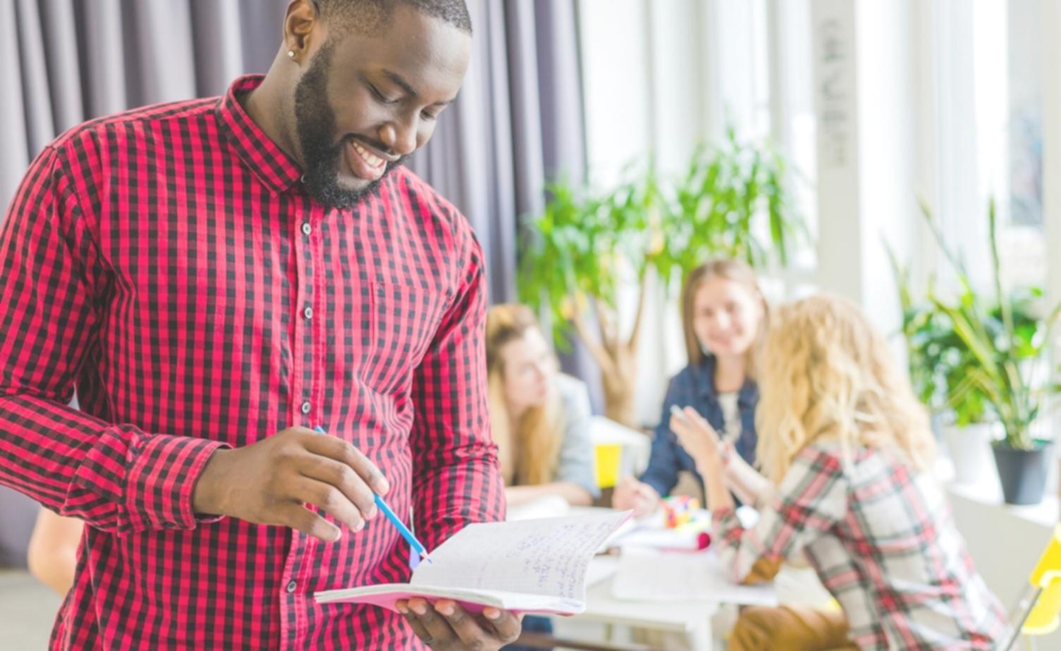 Business professional presenting financial analysis in modern office meeting room