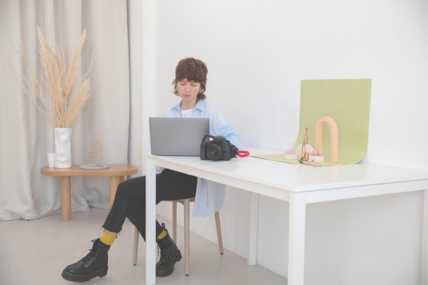 Financial analyst working with budget spreadsheets and performance metrics